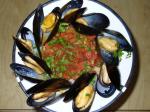 British Steamed Clams With Chorizo and Tomatoes Appetizer
