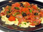 American Tagliatelle With Salami Olives and Ovenroasted Tomatoes Dinner