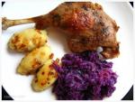 French Roasted Goose Legs with Steamed Red Cabbage and Dodolle Appetizer