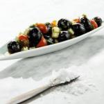 Spanish Spanish Black Olives with Cucumber and Eating Cherries Appetizer