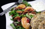 American Mixed Green Salad With Oranges Dried Cranberries and Pecans Appetizer