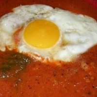Indian Broken Egg Curry Breakfast