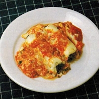 Italian Cannelloni with Beef Filling and Tomato Sauce Dinner