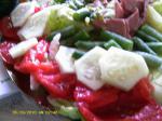 American Disneys Tomato Green Beans and Salami Salad With Vinaigrette Appetizer