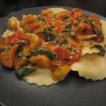 American Ravioli with a Creamy Tomatovegetable Sauce Appetizer