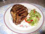 American Grilled Rib Eye Steak  Red Onions Dinner