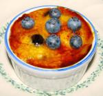 American Lemon Pudding Brulee With Blueberries Dessert