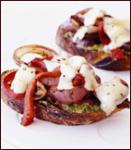 Canadian Grilled Cheddar Toasts With Red Onions and Peppers Appetizer