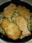 American Pork Chops over Parmesan Rice With Peas Dinner