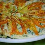 American Omelet with Fresh Herbs the Courgettes and the Flowers of Courgette Appetizer