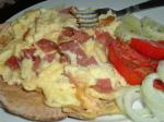 American Scrambled Eggs and Fried Beef Salami Appetizer