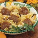 British Tangy Meatballs Over Noodles Appetizer