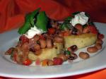 American Polenta Rounds With Blackeyed Pea Topping Appetizer