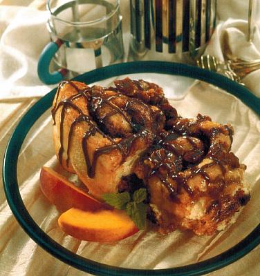 American Gooey Caramel and Chocolate Pecan Rolls Dessert