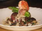 Australian Ostrich Steaks With Prawns and a Roasted Garlic Sauce Dinner