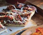 British Grilled Flatbreads with Caramelized Onions Sausage and Manchego Cheese Appetizer