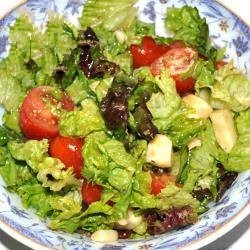 American Salad with Cherry Tomatoes Cheese and Black Garlic Appetizer