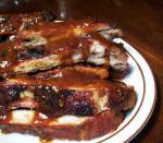 American Smoky Sweet Spareribs With Sauce and Beans Dinner