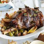 American Slowcooked Greek Easter Lamb with Lemons Olives and Bay Leaves BBQ Grill