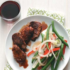 American Spiced Pork Medallions with Bourbon Sauce Appetizer