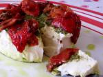 British Brie Topped With Pesto and Sundried Tomatoes Appetizer