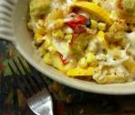 American Cheesy Zucchini and Corn With Pesto Bread Topping Appetizer