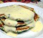 American Spinach Cakes With Gouda Cheese Sauce Appetizer