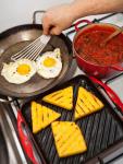 British Grilled Polenta With Spicy Tomato Sauce and Fried Eggs Recipe Appetizer