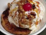 American Grilled Pineapple Topped With Ice Cream and Candied Walnuts Dessert