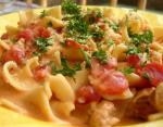 American Pasta with Sausage Tomatoes and Cream Dinner