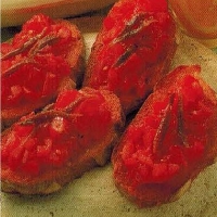 British Tomato And Anchovy Toasts Appetizer