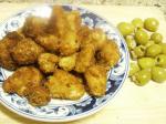American Deepfried Garlic Cloves and Green Olives Appetizer