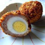 Canadian Scottish Eggs coated with Sausage and Au Gratin Appetizer