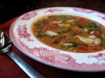 American Spicy Cajun Crab and Greens Soup Appetizer