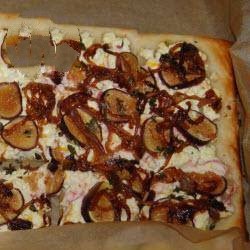 American Puff Pastry Pizza from a Plate with Goat Cheese and Figs Caramelized Onions Appetizer