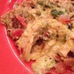 American Scrambled Eggs with Tomatoes Pesto Sauce and Cheese Appetizer