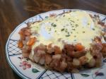 American Corned Beef Hash With Poached Eggs Under Hollandaise Appetizer