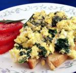 British Scrambled Egg With Spinach and Feta on Toast Appetizer