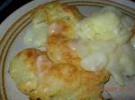 French Scalloped Potatoes With Heavy Cream and Cheese Appetizer