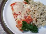 American Baked Fish With Spinach and Tomatoes Dinner