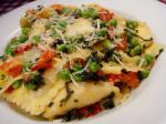 American Ravioli With Peas Tomatoes And Sage Butter Sauce Appetizer