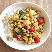 Singaporean Chickpea Curry with Roasted Cauliflower and Tomatoes Dinner