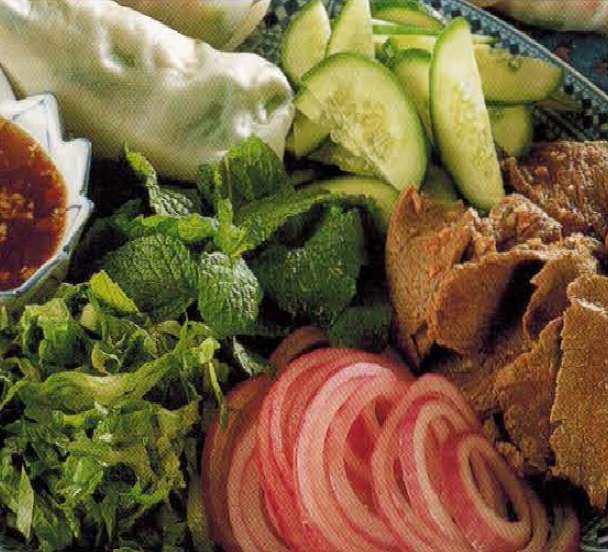 American Beef Fondue With Rice Paper Wrappers And Salad Appetizer