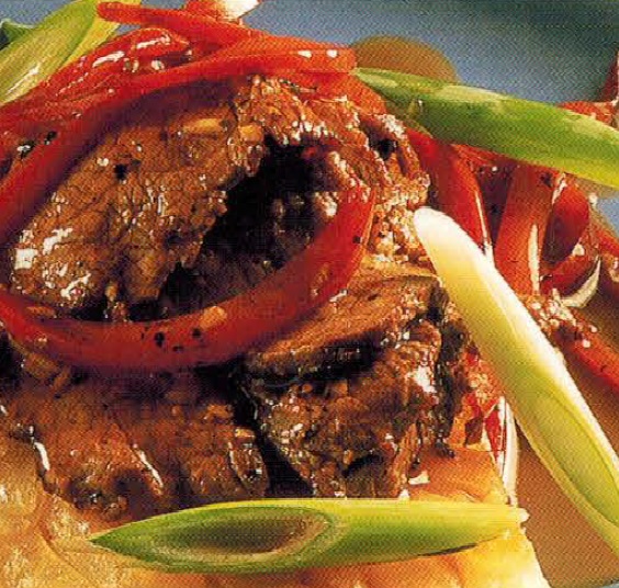 American Fried Rice Noodle Pancake Seared with Peppers and Garliced Beef Appetizer