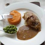 Vegan Stuffed Cabbage with Sweet Mashed Potatoes Peas and Brown Sauce recipe