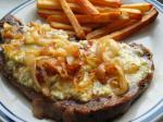 Pub Style Peppered Stilton Steaks With Charred Onions and Chips recipe