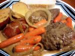 Swiss Slow Cooker Swiss Steaks With Beef Gravy and Potatoes Dinner