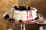 American Triplelayered Vanilla Pavlova With Cherry Sauce Recipe Dessert