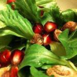 American Green Leaf Salad with Pistachios and Pomegranate Seeds Appetizer