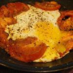 American Eggs to the Saucepan Together with Tomatoes in Wet Appetizer